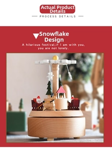 Close-up of wooden Christmas music box with Santa and reindeer on snowflake base