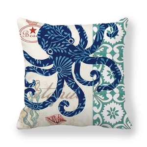 Detail of octopus print on peach skin fabric pillowcase with ocean and beach motifs