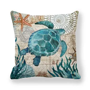 Macro detail of nautical pillow case featuring a turquoise sea turtle on vintage map fabric