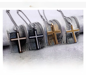 Detail of multi-color stainless steel cross pendants with glitter inlay on ball chains