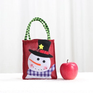 Weihnachts-Geschenkbeutel aus Jute mit Schneemann-Motiv und gestreiften Henkeln für Äpfel
