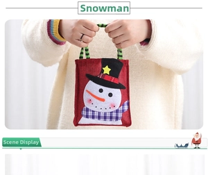 Detail der Weihnachts-Geschenktüte aus Jute mit Schneemann-Applikation und gestreiftem Griff