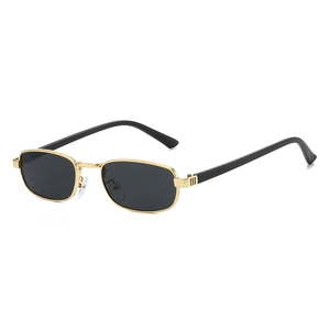Vintage gold metal square frame sunglasses with black lenses and stripe temple details