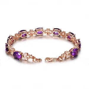 Detailed view of rose gold clover bracelet with purple amethyst stones and lobster clasp
