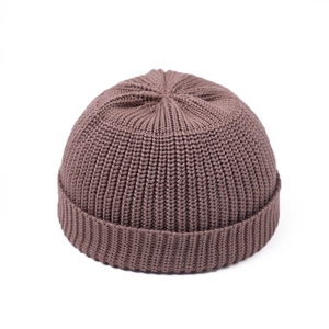 Close-up of dark brown ribbed knit beanie with thick vertical stripes and wide cuff detail
