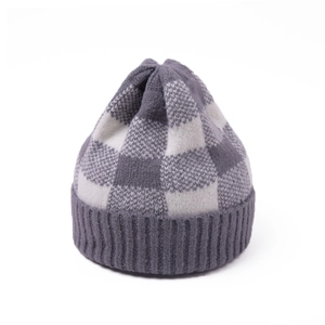Close-up of grey checkerboard knit beanie with ribbed cuff and thick warm texture