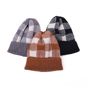 Three-pack winter plaid knit beanies in gray, brown, and black colors for women
