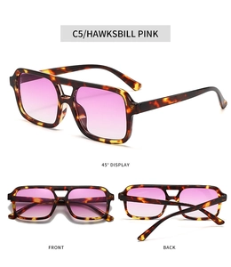 Detail of square sunglasses with hawksbill pink frames and double bridge retro design