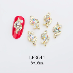 Detailed view of 8x16mm marquise nail alloy rhinestones with gold base and sparkle finish