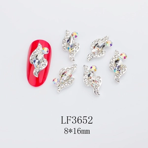 Detailed close-up of 8x16mm alloy rhinestone nail art charm with K9 crystal luster