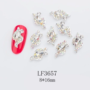 Macro view of 8x16mm horse eye alloy nail charm with colorful aurora rhinestones