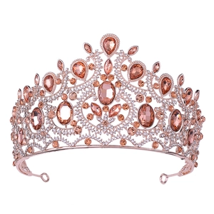 Close-up of luxury Baroque crown with champagne crystals and rose gold metal base