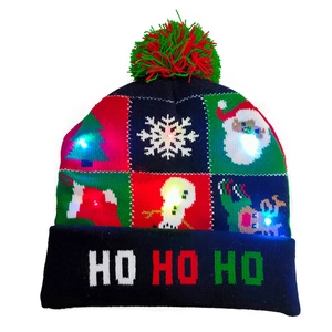 LED Christmas knit hat with pompom and Santa patterns featuring bright colorful lights