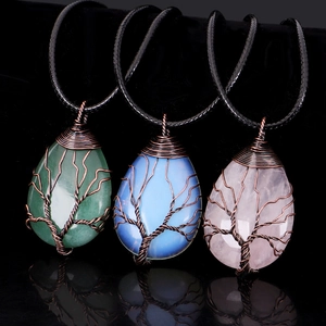Three handmade wire wrapped Tree of Life natural stone necklaces with teardrop pendants