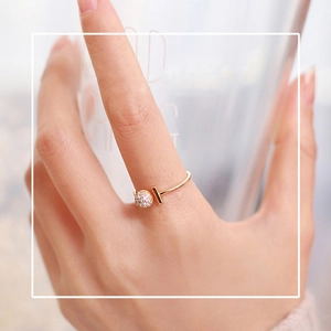 Adjustable gold plated ring with micro-paved crystal ball and T-bar minimalist design