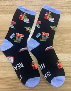Funny I'M READING themed cotton crew socks with book and coffee cup patterns on wood background