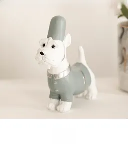 Detailed view of schnauzer dog figurine in grey-green uniform for home decor