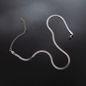 Silver flat snake bone chain necklace in 18K gold plated stainless steel with lobster clasp
