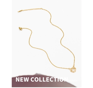 Detail of 18K gold-plated stainless steel necklace featuring a hollow tiger head pendant