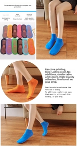 Detail of non-slip cotton yoga socks with dense orange silicone grips on the sole