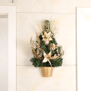 Artificial wall-mounted Christmas tree with gold poinsettias and pine cones in a woven pot