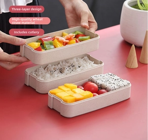 Three-tier stackable wheat straw bento box showing separate compartments for food storage