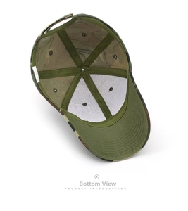 Detail view of the digital camouflage baseball cap interior with green sweatband and label