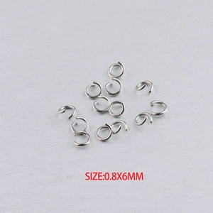 Detailed view of silver stainless steel 0.8x6mm open jump rings for DIY jewelry making
