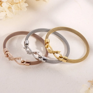 Mesh bracelet with infinity symbol and Forever engraving in gold, silver, and rose gold
