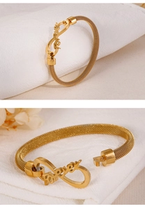 Macro detail of golden infinity forever bracelet with intricate woven mesh texture