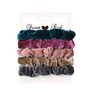 5-piece set of velvet scrunchies in vintage colors on a Sweet Girl card display
