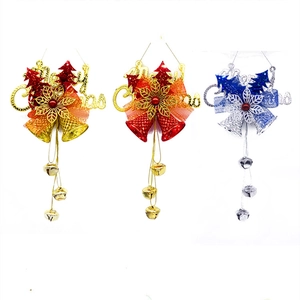 Three Merry Christmas bell ornaments in gold, red and silver with bows and star detail