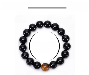 Detailed view of 12mm black agate and tiger eye bead bracelet with size specifications