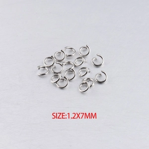 Macro shot of 1.2x7mm silver stainless steel open jump rings for DIY jewelry making