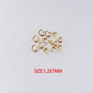 Detailed view of 1.2x7mm golden stainless steel open jump rings for DIY jewelry making