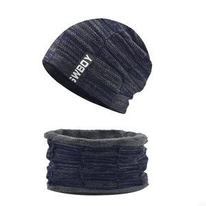Detail view of winter knitted hat and scarf set with thick navy thermal fleece lining