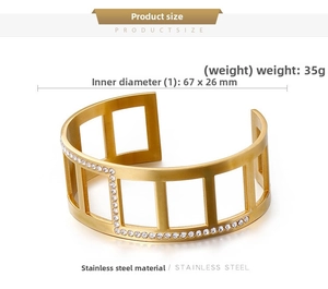 Macro detail of gold matte titanium steel bangle with rectangular hollows and white zircon