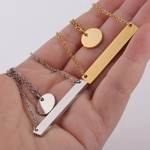 Double layered gold and silver stainless steel necklace with bar and disk pendants
