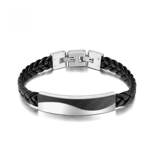Detail of a braided black leather bracelet featuring a carbon fiber stainless steel clasp