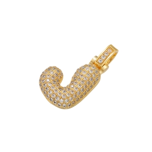 Macro shot of gold-plated letter J pendant featuring clear cubic zirconia crystal settings