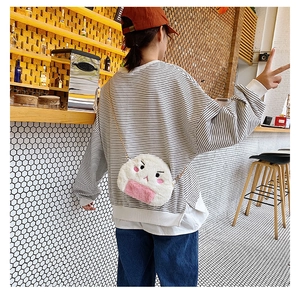 Back view of cute white plush rice ball crossbody bag with pink embroidery and gold chain