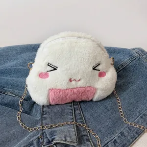 Detail of cute white plush rice ball crossbody bag with pink accents and metal chain