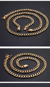 Detailed view of 15mm golden Cuban chain necklace and bracelet set with box clasp