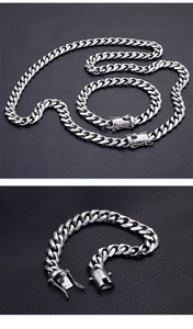 Detail of 18K gold-plated curb chain necklace and bracelet with secure box clasp