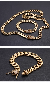 Detail view of 18K gold plated Cuban chain necklace and bracelet with CZ diamond clasps