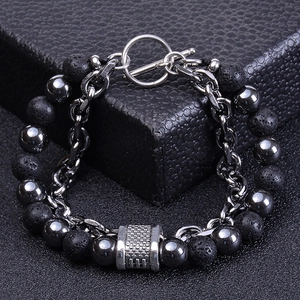 Close-up of double-layer bracelet with volcanic stone beads and stainless steel chain