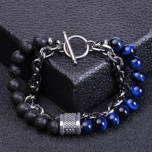 Detail of dual-strand bracelet with black lava, blue tiger eye beads and silver T-bar clasp