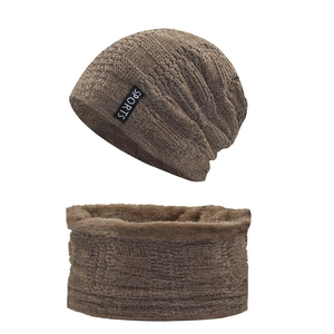 Detail of coffee brown knitted hat and scarf set with thick warm fleece lining and sports tag