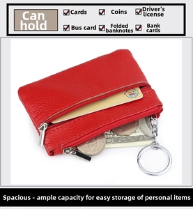 Red pebbled leather coin purse with dual zippers showing space for coins and cards