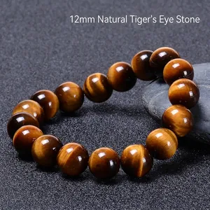 Macro shot of 12mm natural tiger eye stone bracelet beads with glossy cat-eye effect